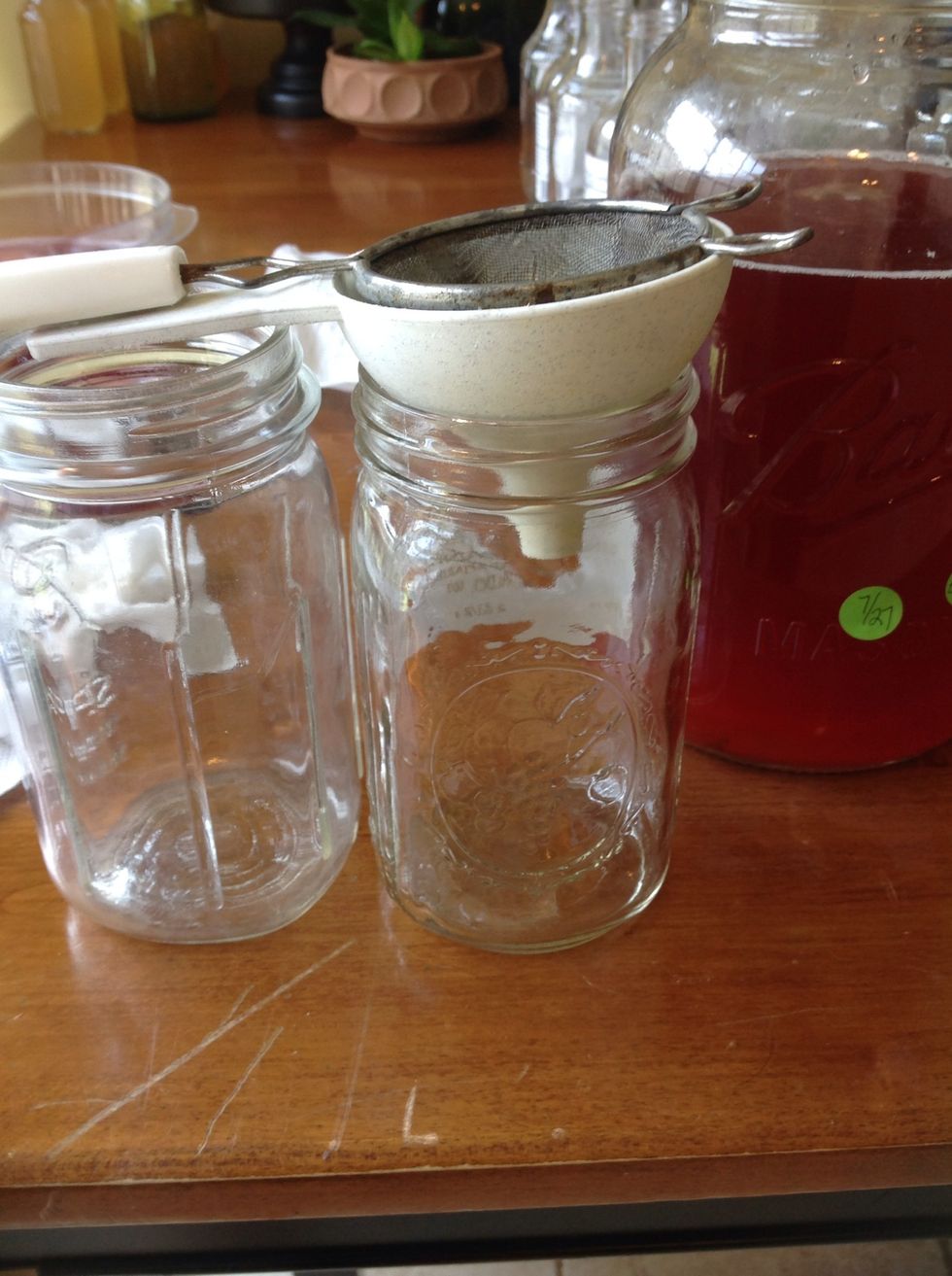 If I'm  using fruit to add additional flavor, I use regular size ball jars instead of bottles because it's easier to add fresh fruit.