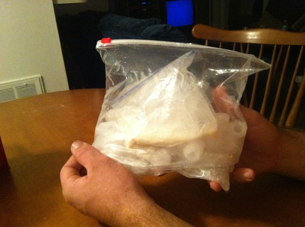 If ice begins to melt, add more ice and salt to the gallon bag.