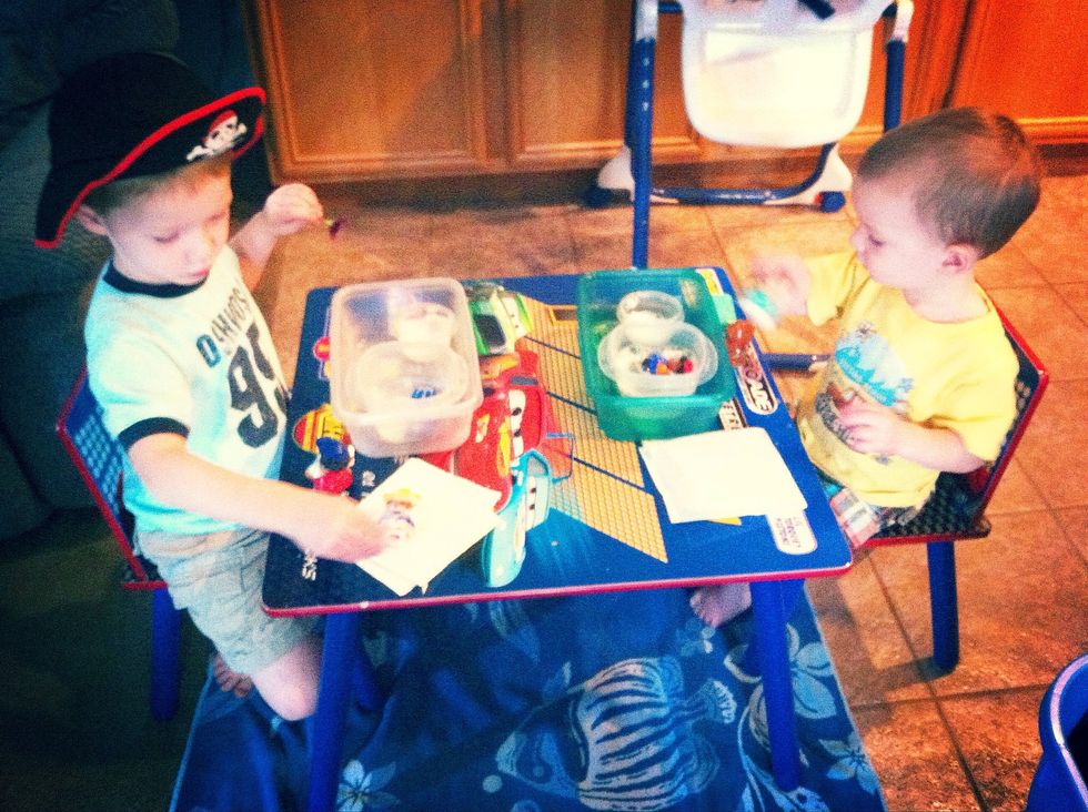 If indoors, place a large towel under play area. We sat the kids at the table & gave each kid their own car wash/toy bath.