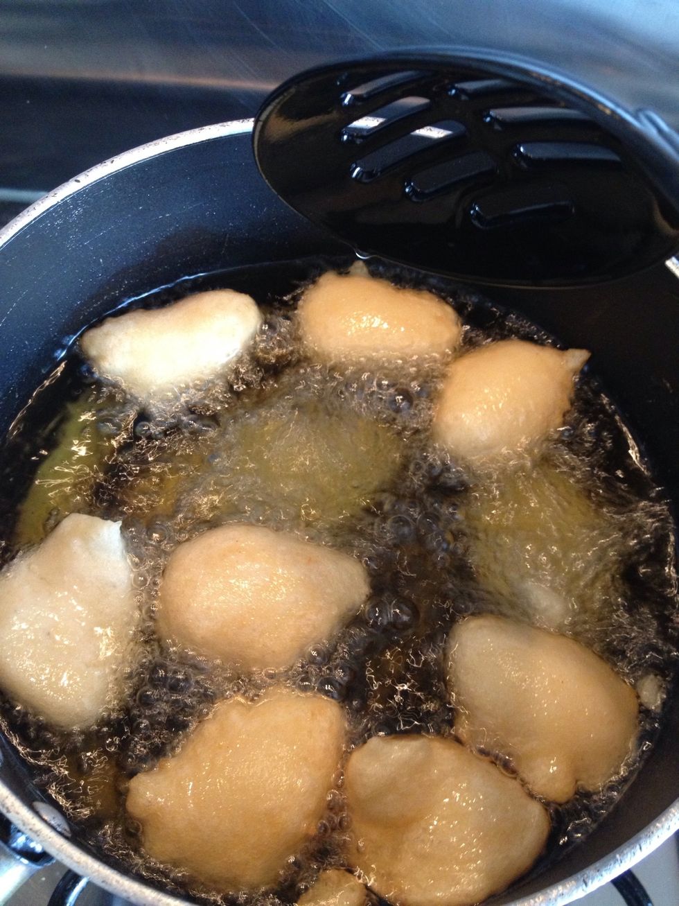 If it sticks to d bottom of d pot, use ur spoon or water to shift it so it floats. And fry until brown.