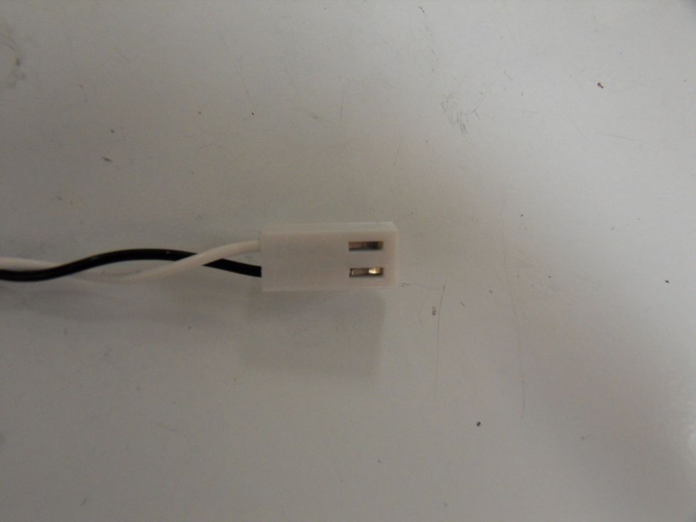 If later adjustments need to be made to the string, push these metal tabs to remove the wires.