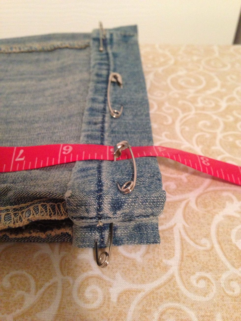 If original seam is less than 1.25" from fold then remove seam. The seams on this pant was 1-1/8". This is a pain so it's better to buy longer pants for easier chopping.