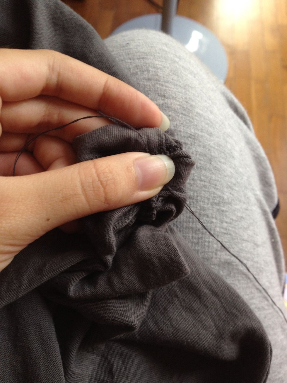 If satisfied with the scrunches, secure a knot at the end of your stitches.