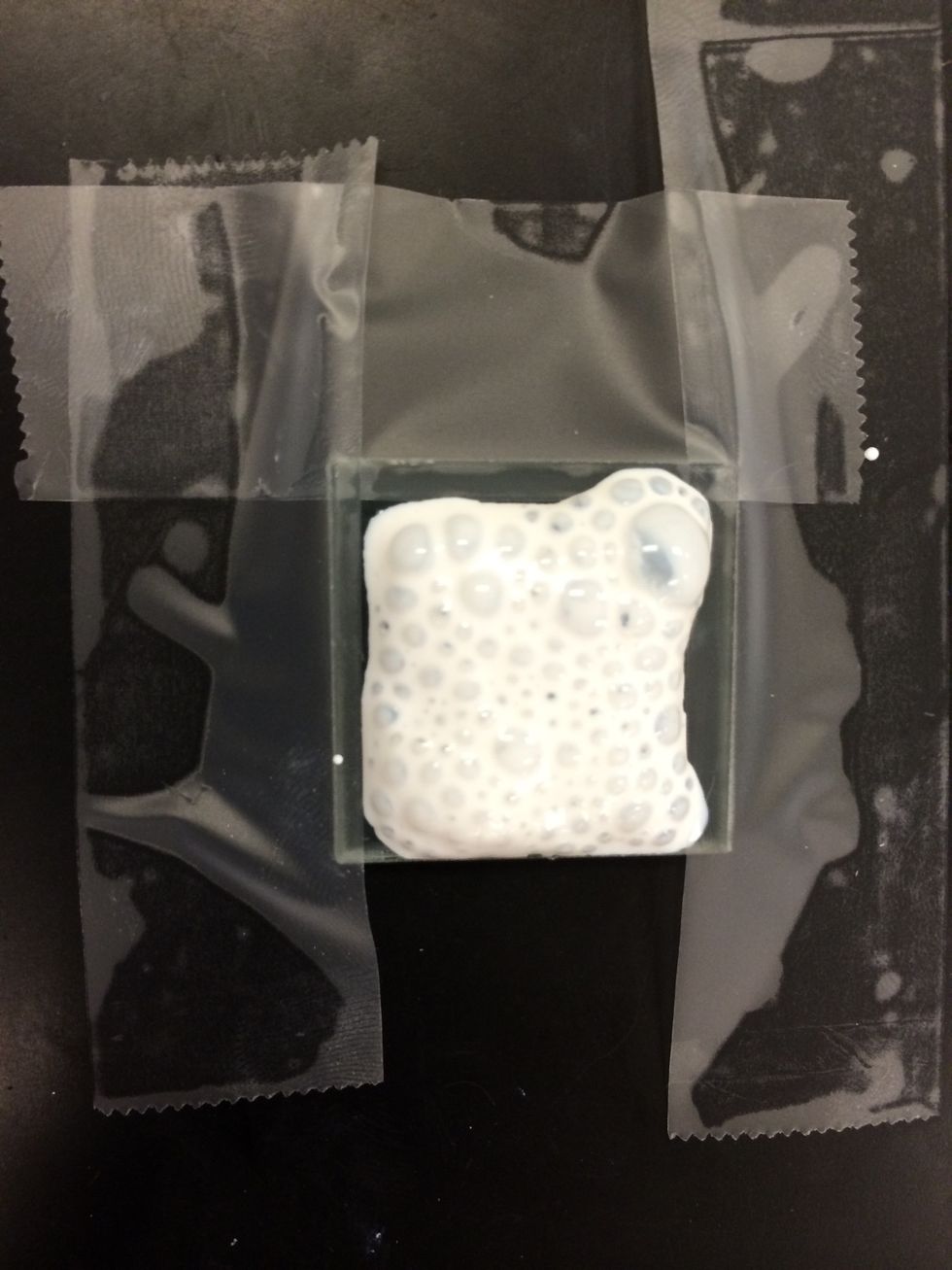 If the coating does not look uniform, the material can be wiped off the plate with a damp tissue. The deposition should bd repeated with a clean glass rod.