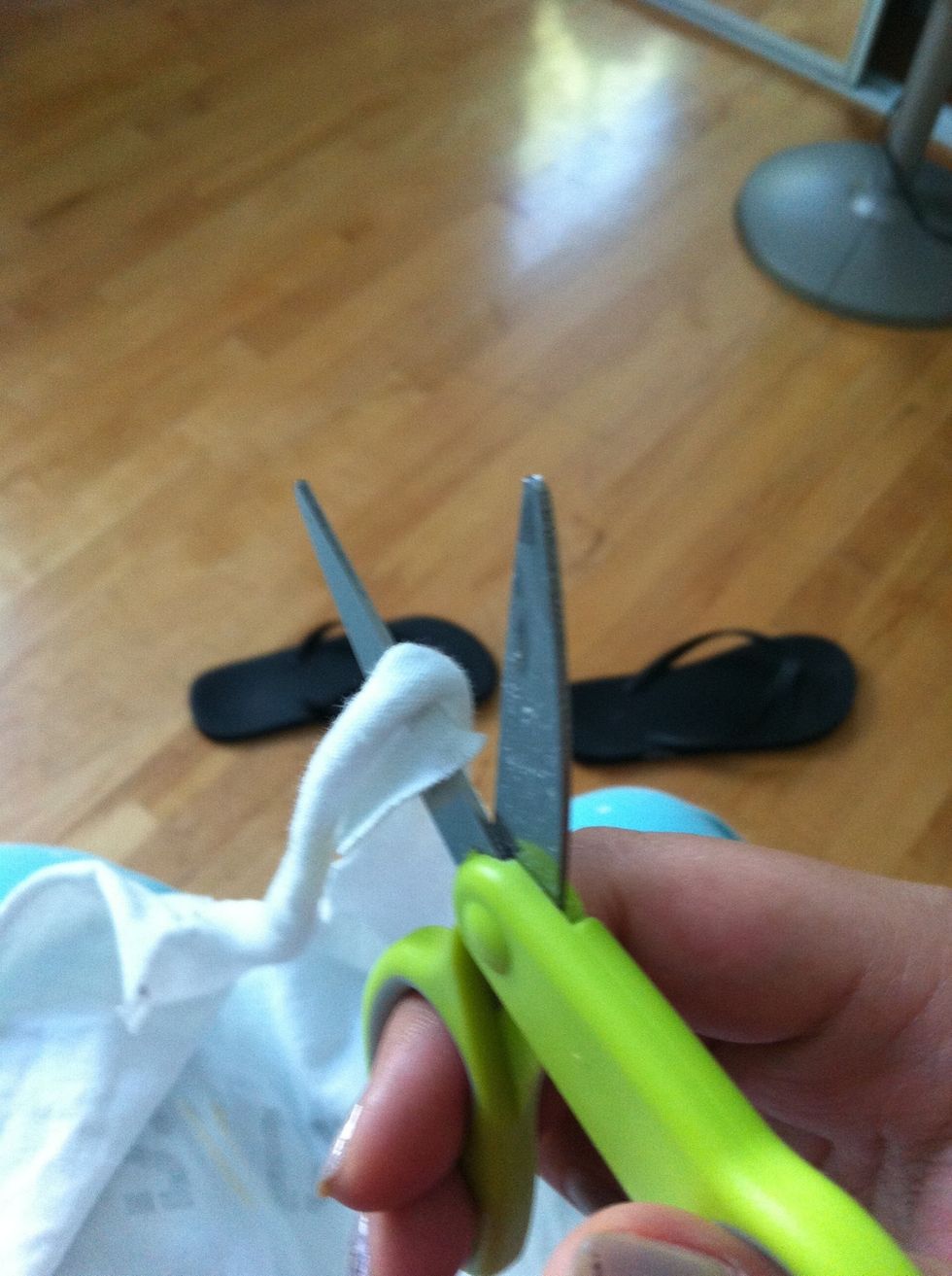 If the hole for the head came out too low,cut the back of it in half so you can tie it.