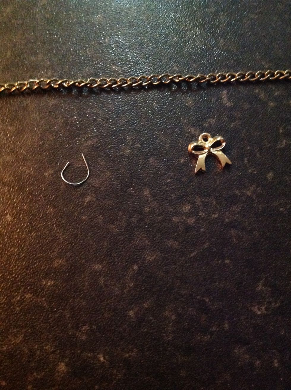 If the loop on the charm is too small take some really thin wire