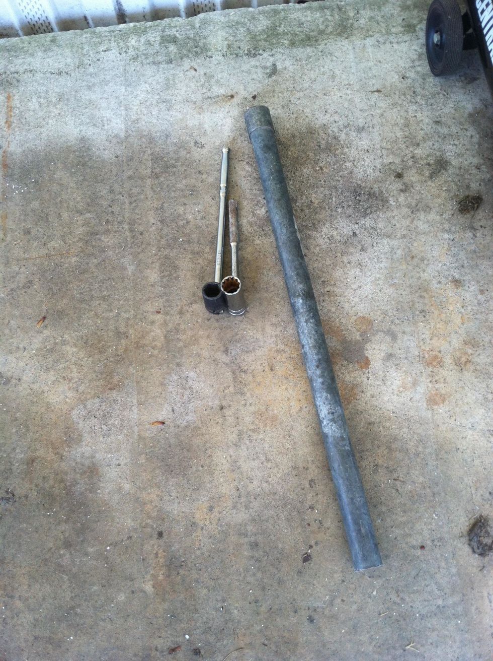 If the nut is resisting, say in a firm voice, "stop resisting" and use the pipe. Slide the pipe over the breaker bar handle and this will give you extra leverage on the nut. DON'T DO THIS ON A RATCHET