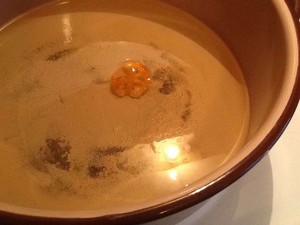 If the oil is heat drop one chip in oil if it starts to bubble up