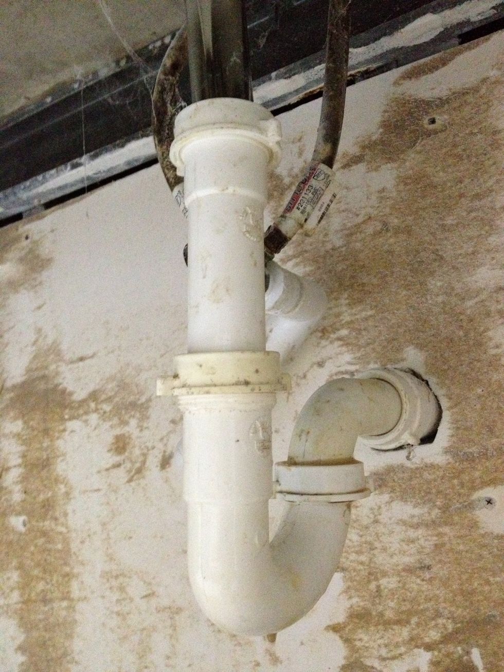 If the rear trap fastener is still jammed and you don't have a wrench, here's a trick...