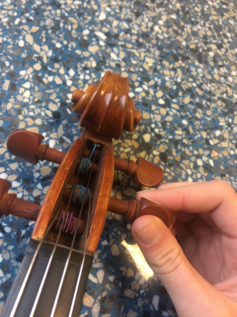 If the strings are very out of tune, you will use the tuning pegs. When making the string go higher, do not turn it too far or your string will snap. Do not be worried if the string gets loose.