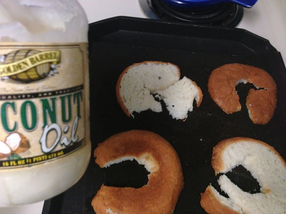 If the whole is too small for an egg yolk to fit in cut around the edges to open the hole a bit bigger.