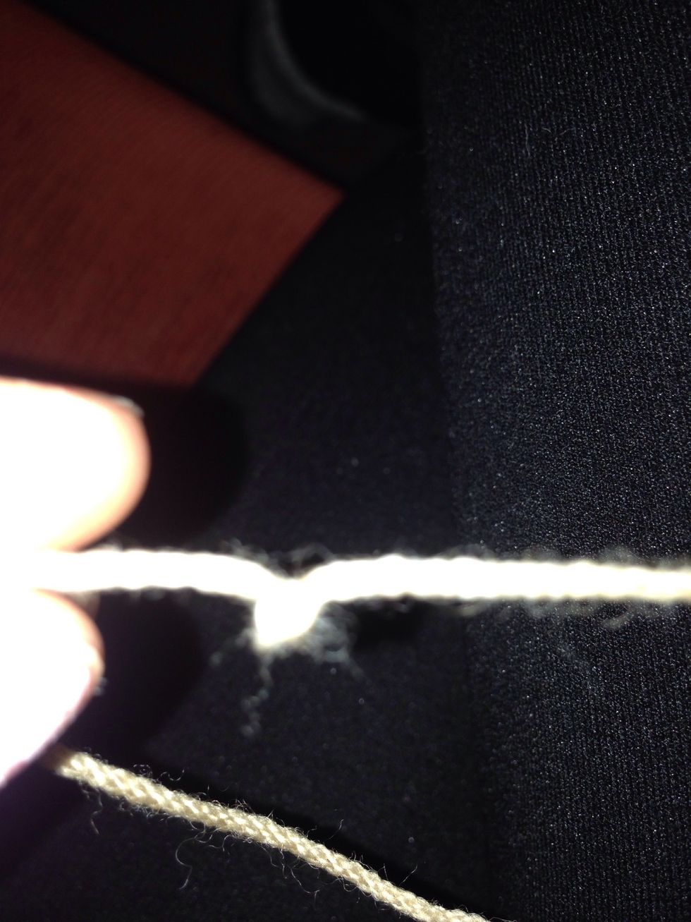 If the wool piece is finished, take a new one and tie it together