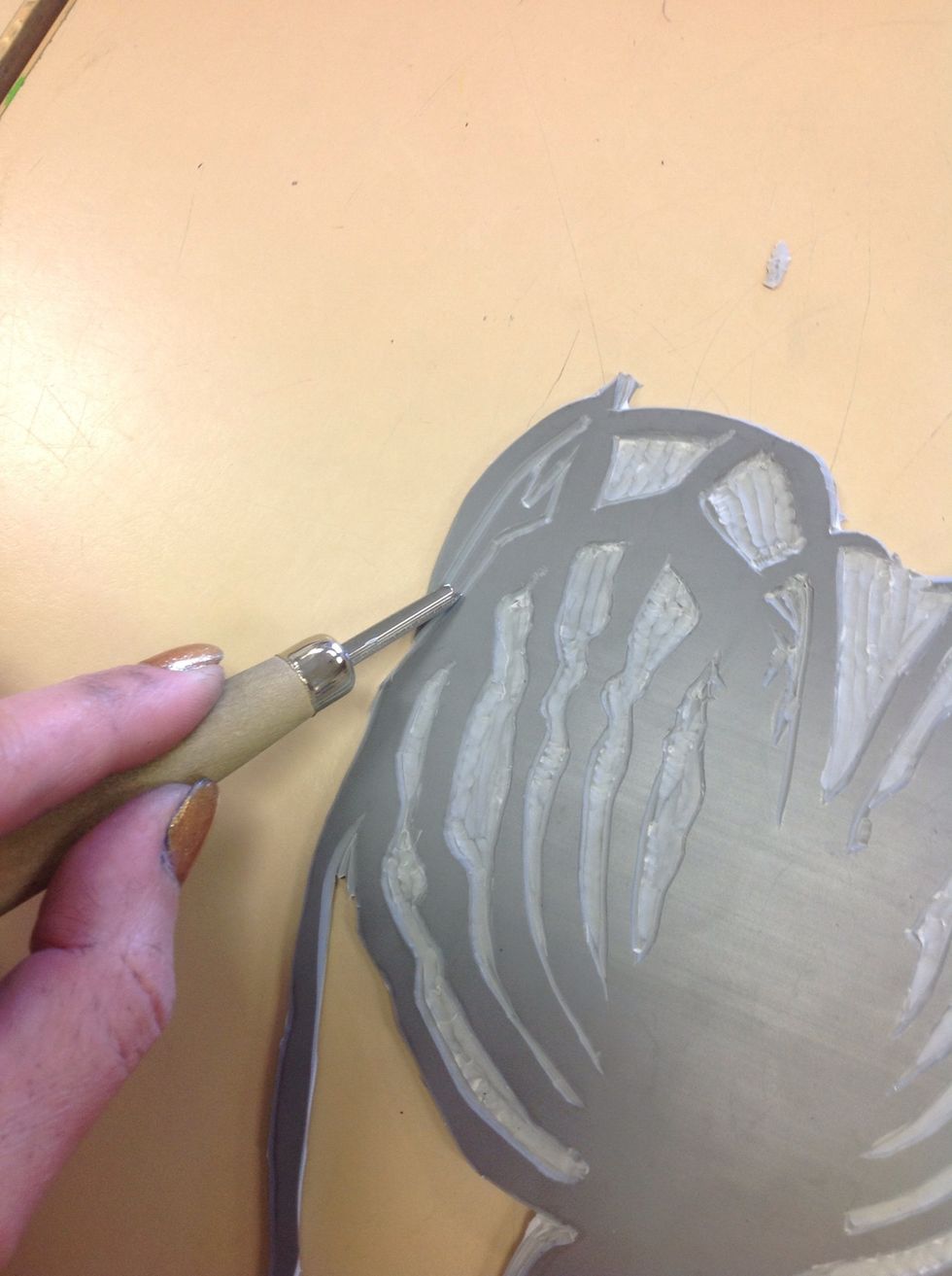 If there are any areas left that were too small for the scissors, simply carve them out with the carving tools.