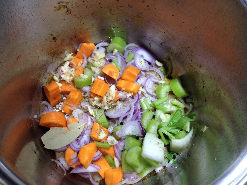 If there's too much blackened bits at bottom of pot, wipe it clean with a paper towel, or de-glaze with a little water then discard. Reduce heat to medium. Add olive oil, and only then add aromatics.