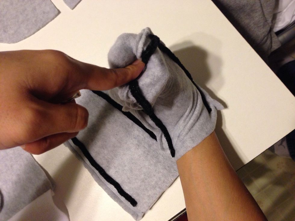 If u are able to stick ur hand in - im grabbing the point and using my left hand to push in and gently pull it out. If u can't u can take a non sharp point stick, push it through gently & then pull