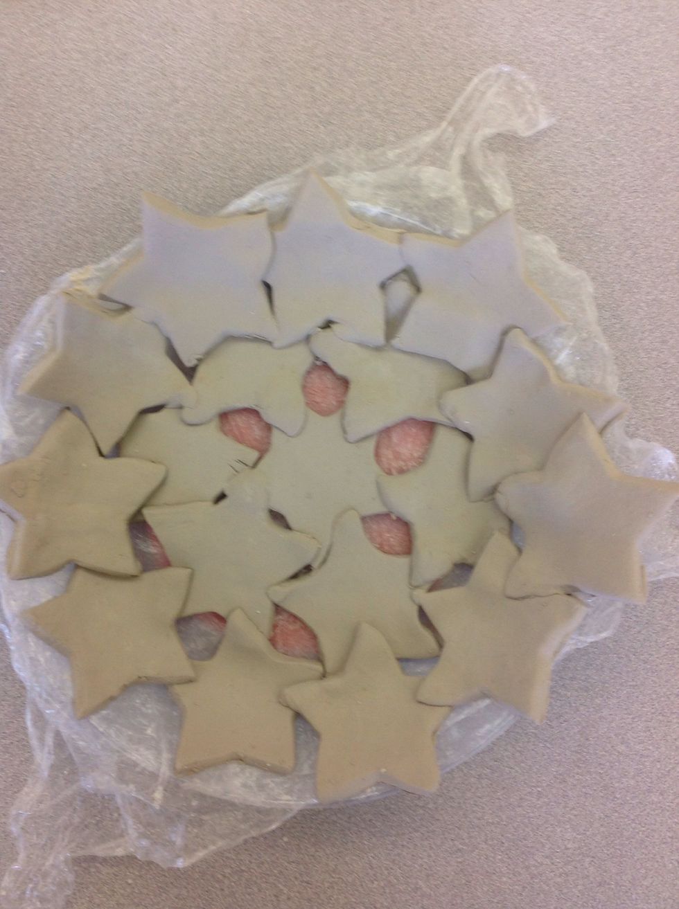 If using air dry clay, use acrylic paint and apply two layers of clear varnish or gloss medium. If kiln firing, do a bisque fire, then glaze and do a glaze firing. Stay tuned for pic of final project!