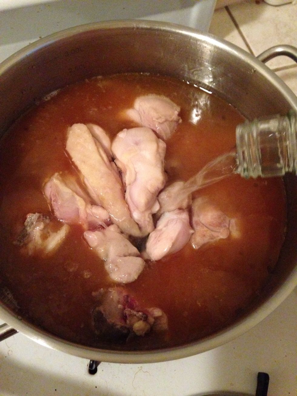 If you afraid of the taste of alcohol, you can only pour half bottle and add water till it cover chicken.
