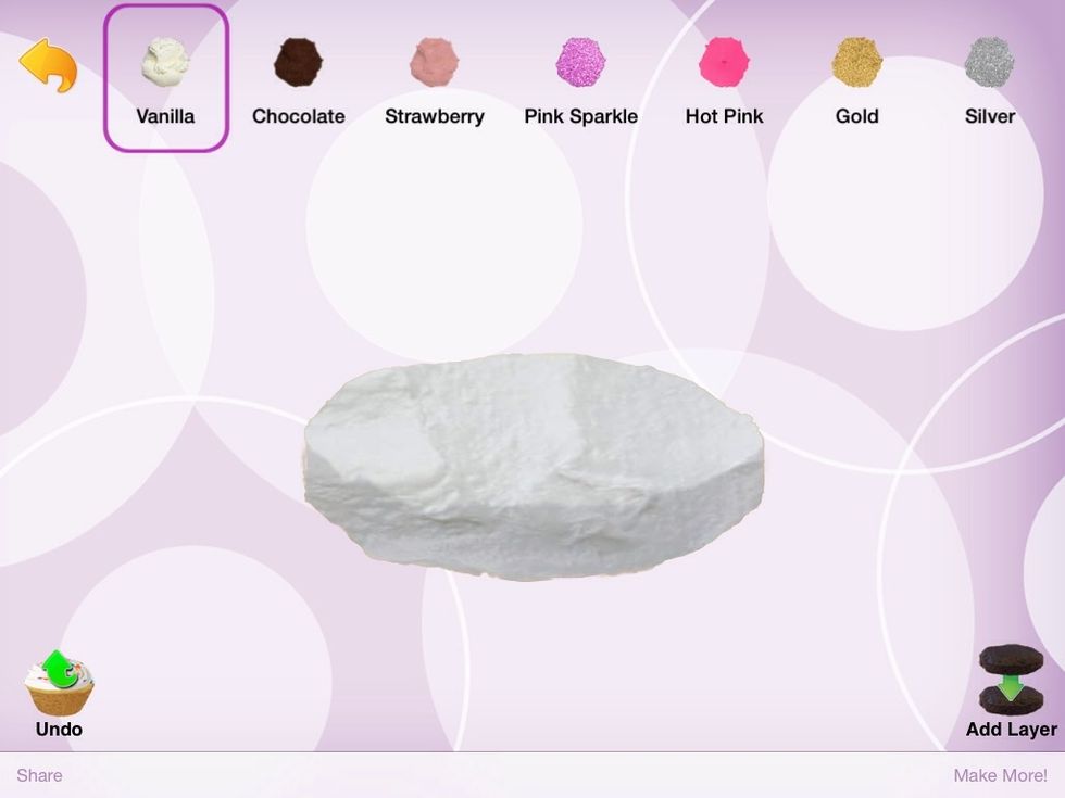 If you are doing layered like me you will need to put vanilla frosting all over the first layer. It doesn't have to be vanilla frosting but I think vanilla looks better. You could also use black too.