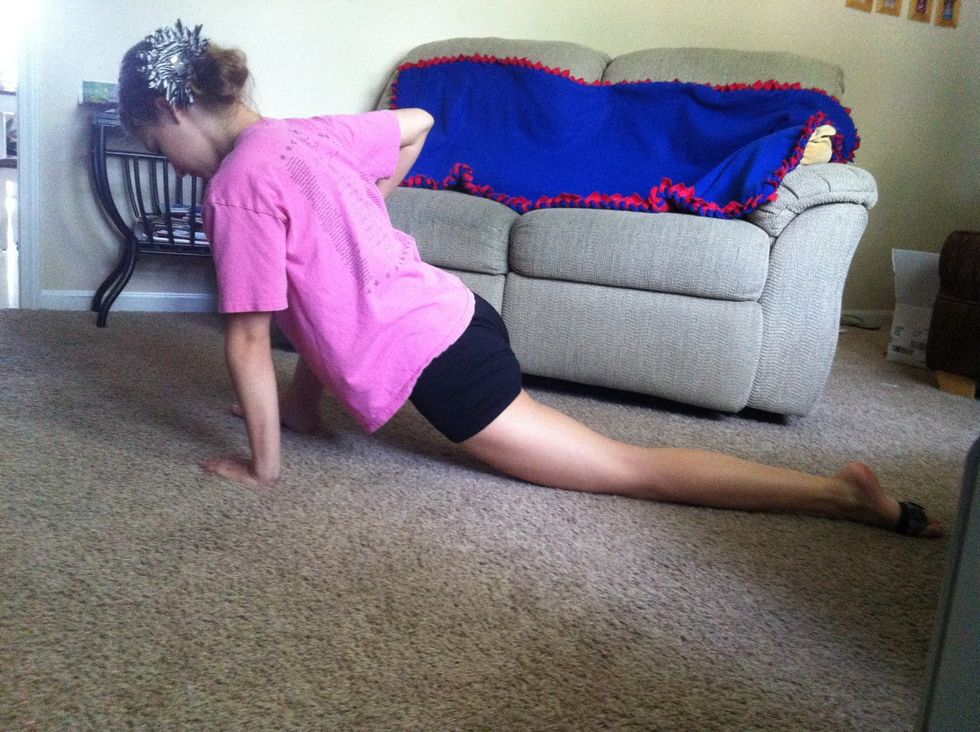 If you are having trouble with your back leg not going down, strech it out by getting in a runners strech with your knee on the groud and your leg straight out. You can also put your elbows down.