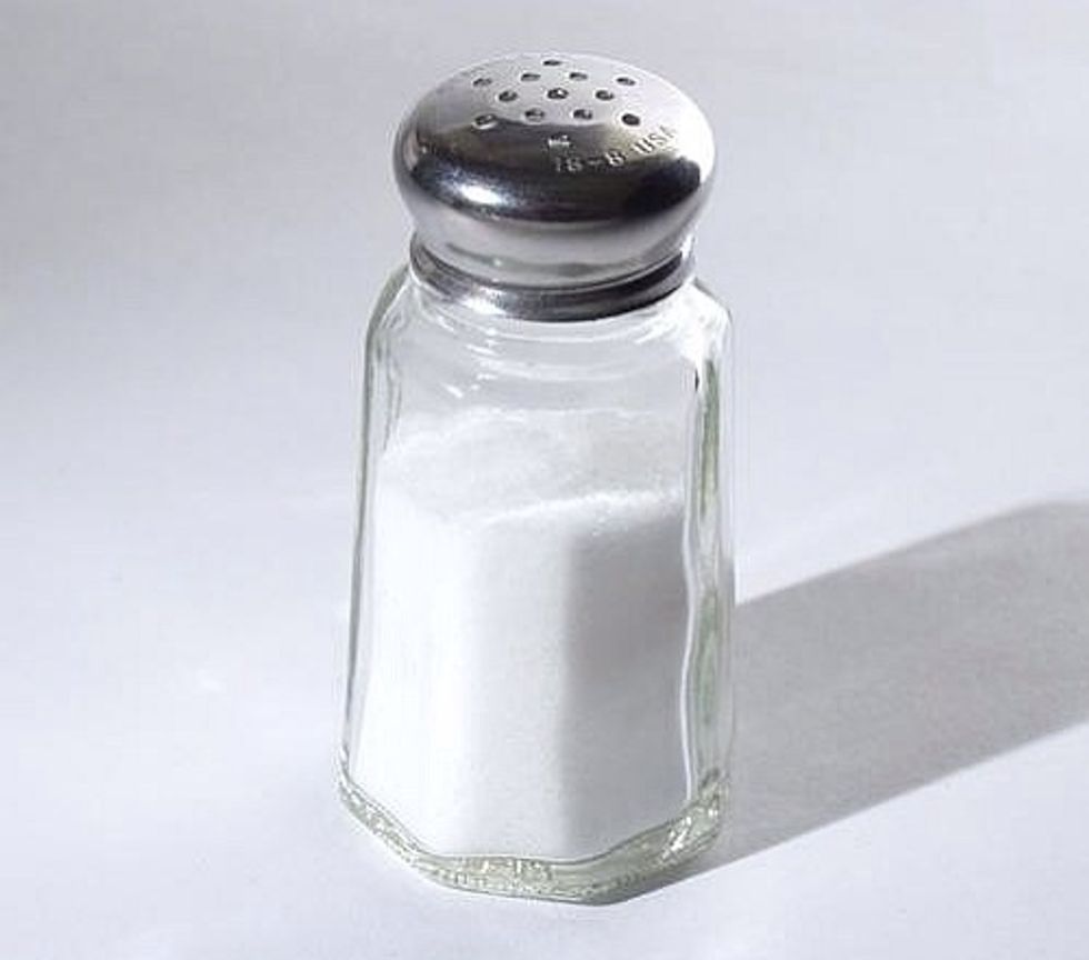 If you are using baking powder, you don't need as much salt because baking powder already has tartaric acid, whilst baking soda does not. Salt can be substituted for tartaric acid sometimes.