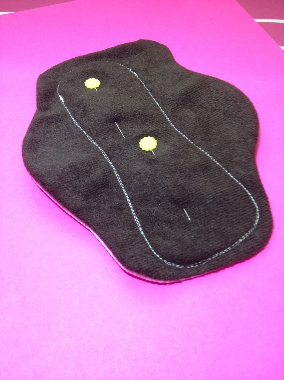 If you are using PUL for backing, when sewing on inner layers sew to top instead of backing and skip this step. Now, re-sew along existing white inner contour line through the whole pad.