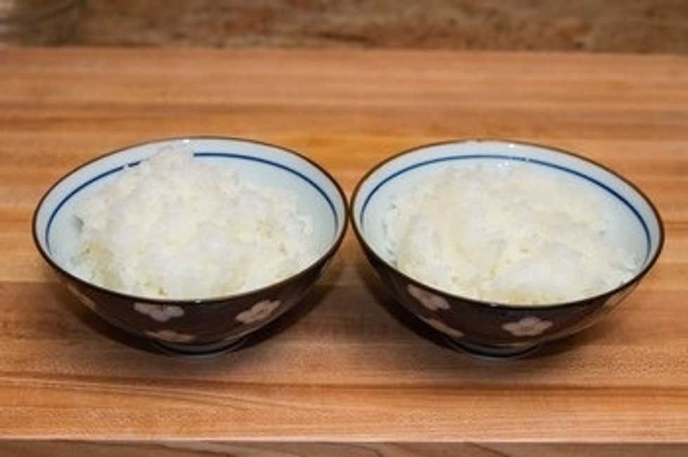 If you are using the leftover rice or frozen rice, warm up in a microwave. The rice should not be cold.