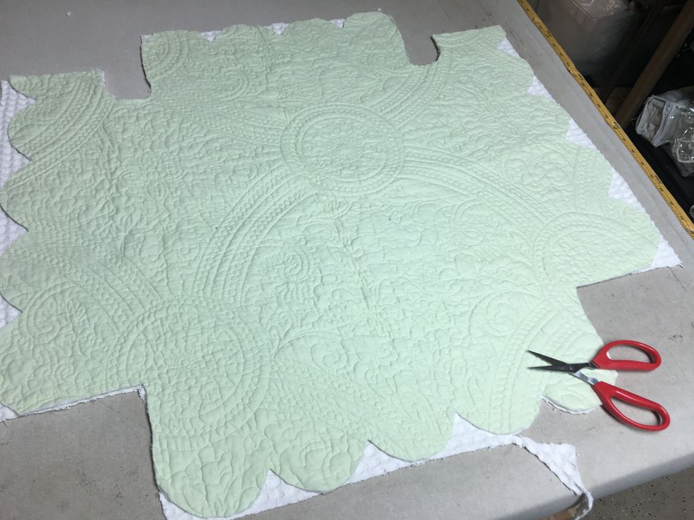 If you are using two fabrics cut the top first then lay it on the contrast side (right sides together) and cut it to match.