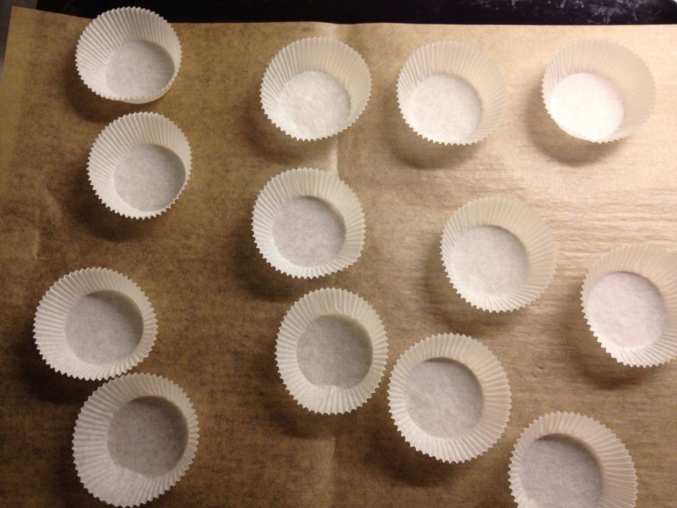 If you choose cupcakes line up cupcake molds on a baking tray.