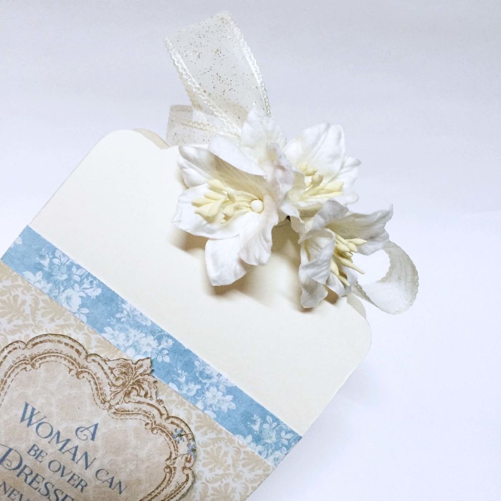 If you'd like to, you might want to add some mulberry flowers to further embellished the gift box.