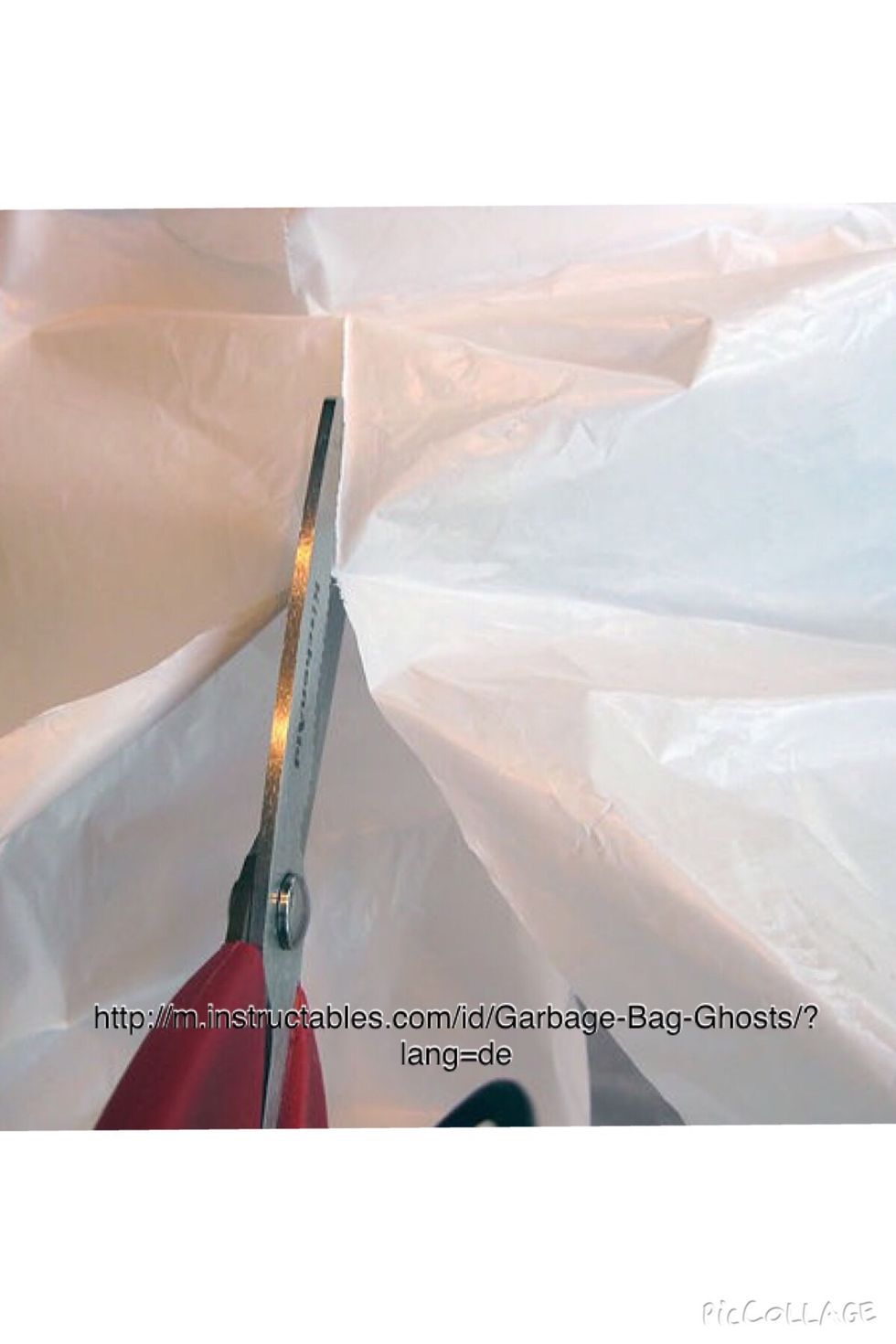 If you don't have a bigger paper than your canvas, cut a garbage bag so you can lay it flat on a surface. It's best if you cut a line directly through the center  of the bag. For reference look above.