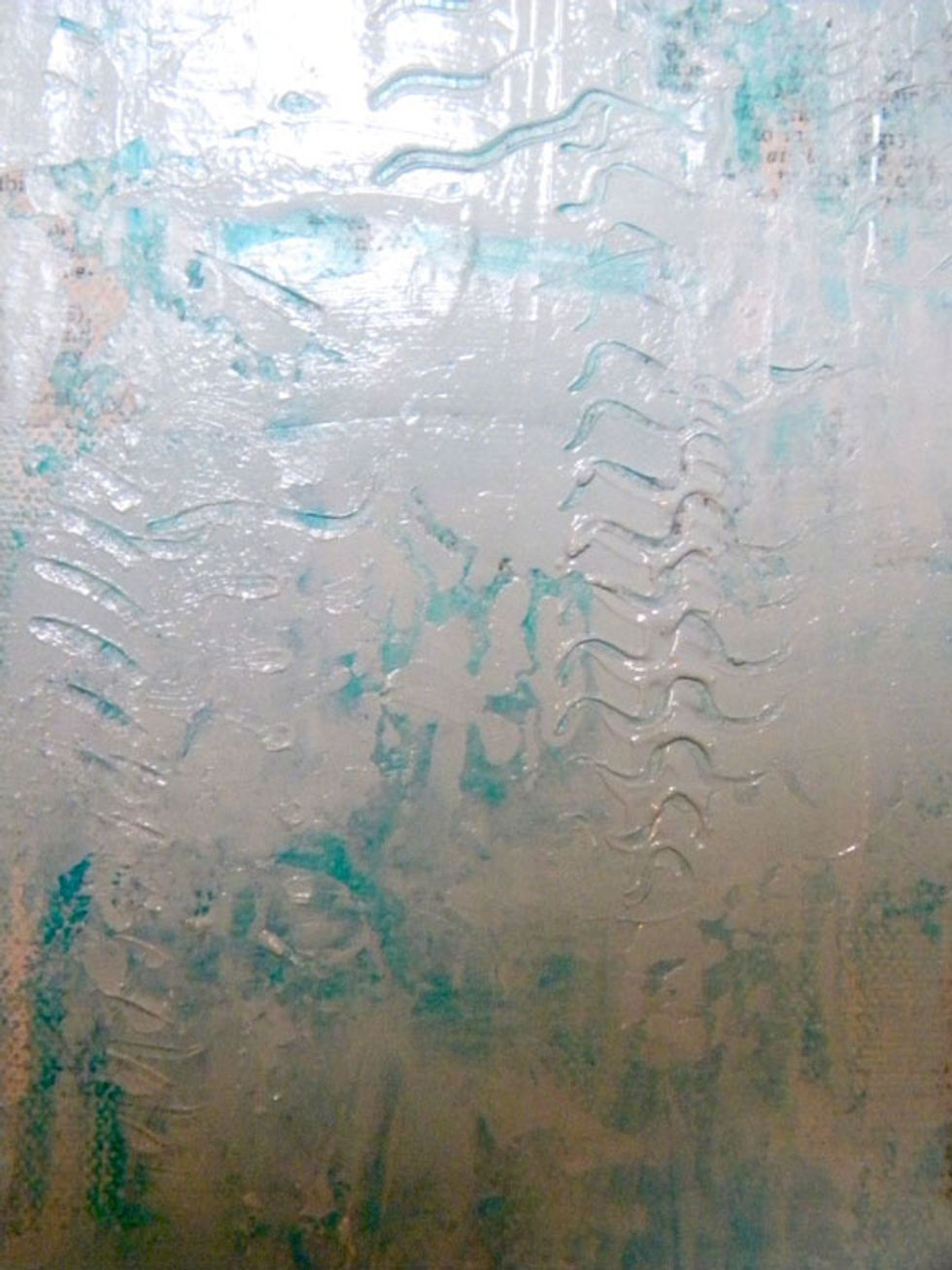 If you don't have a catalyst tool, you can use a comb or an old fork. It adds so much texture to the canvas as we add more color on top. Try other mark making objects and have fun with this part!