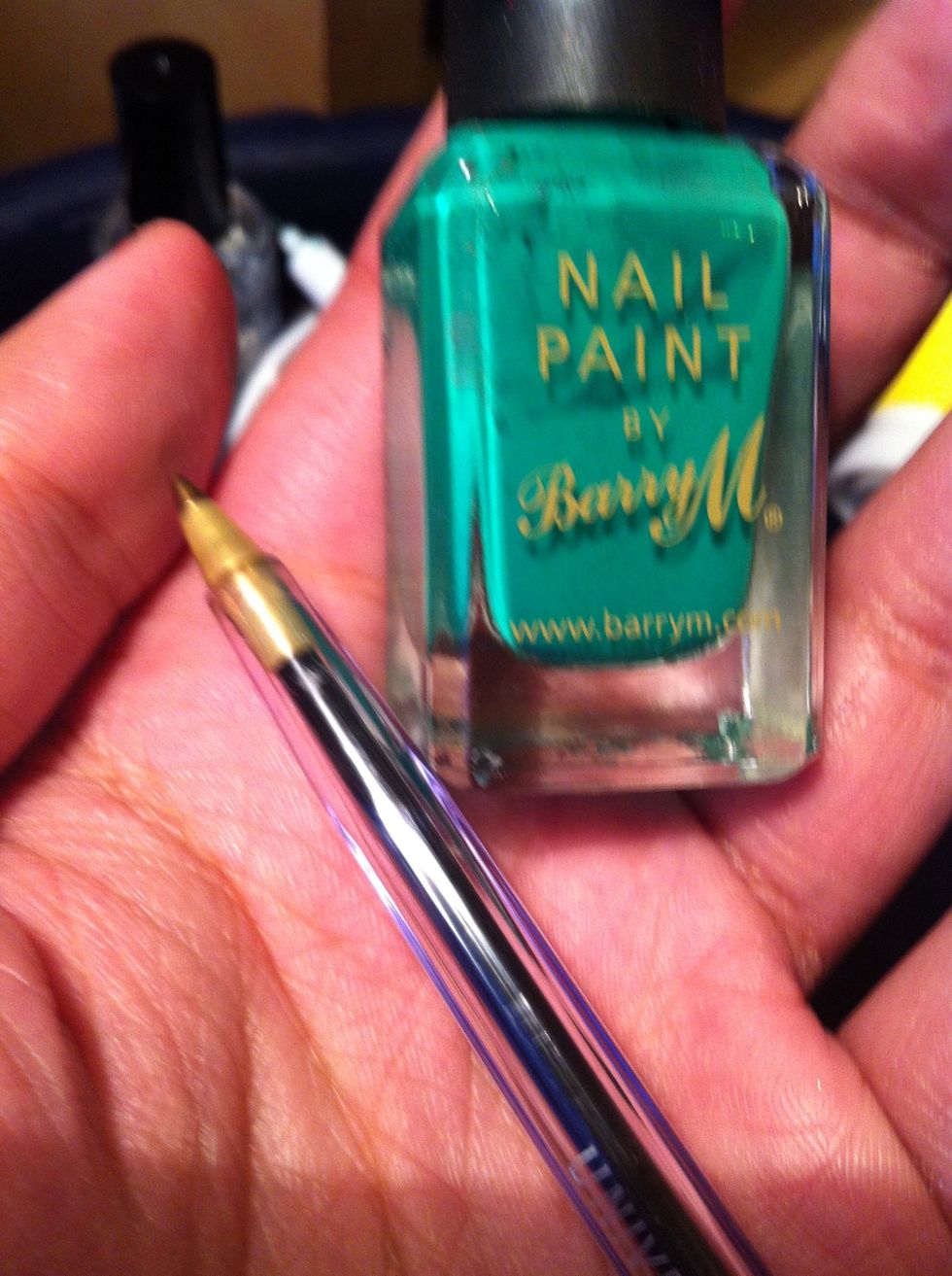 If you don't have a nail art pen, get your ball point pen and green nail varnish