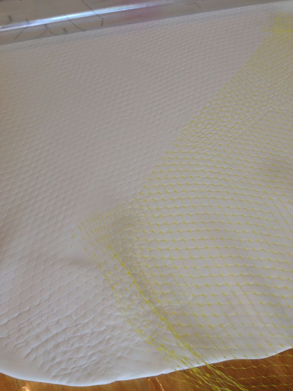 If you don't have "The Mat", you may have to press the pattern onto the fondant after you put it onto the cake, using cake smoothers to press the onion bag lightly into the fondant.