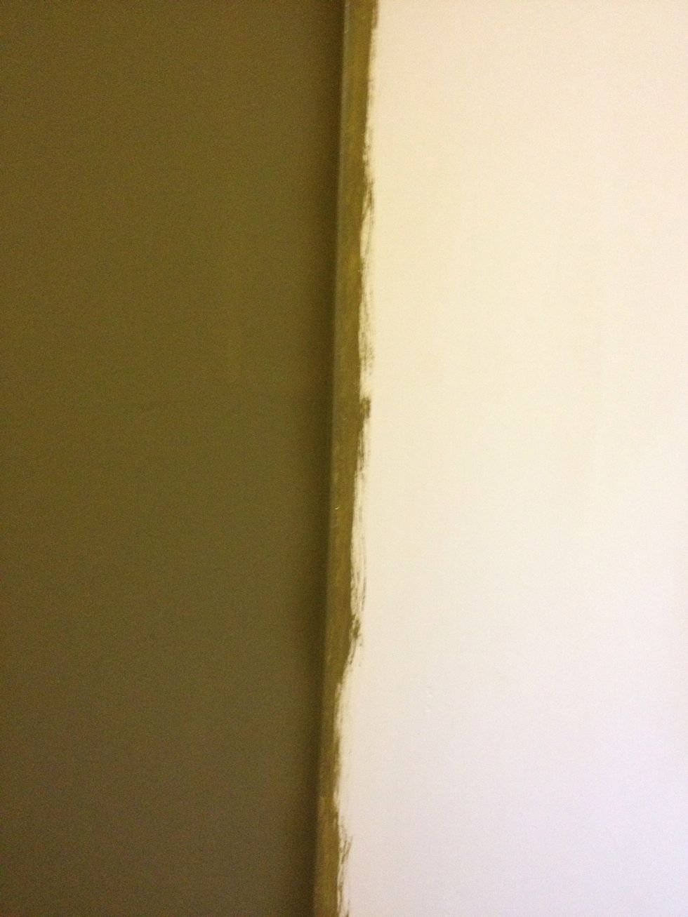 If you don't overlap like this, it's likely that the white drywall underneath will show in the corner & you'll spent all day trying to cover it. Note: the paint I'm using has primer pre-mixed in it.