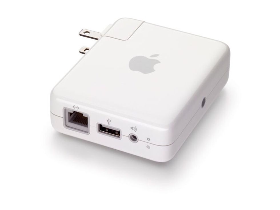 If you don't want to invest in a wireless printer, you can buy an airport express and connect your printer via USB. Also you can connect speakers and everything will work wireless with your iOS device