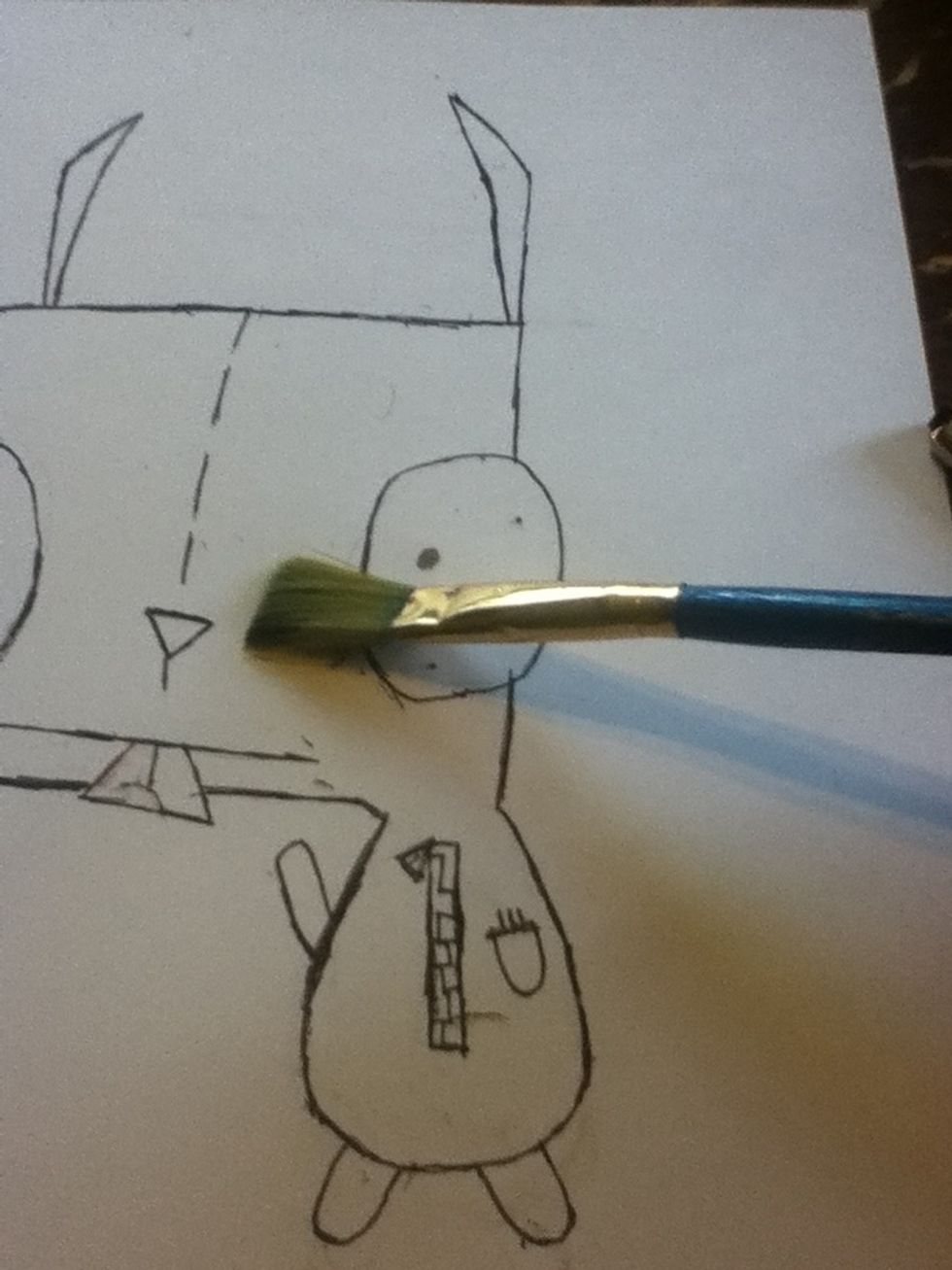 If you don't want to smudge it by brushing away with your hand, a soft brush works well.