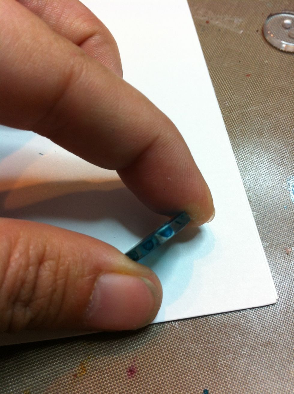 If you find drips on the button's edge (like above), use a bit of rubbing alcohol on a q-tip to remove it.