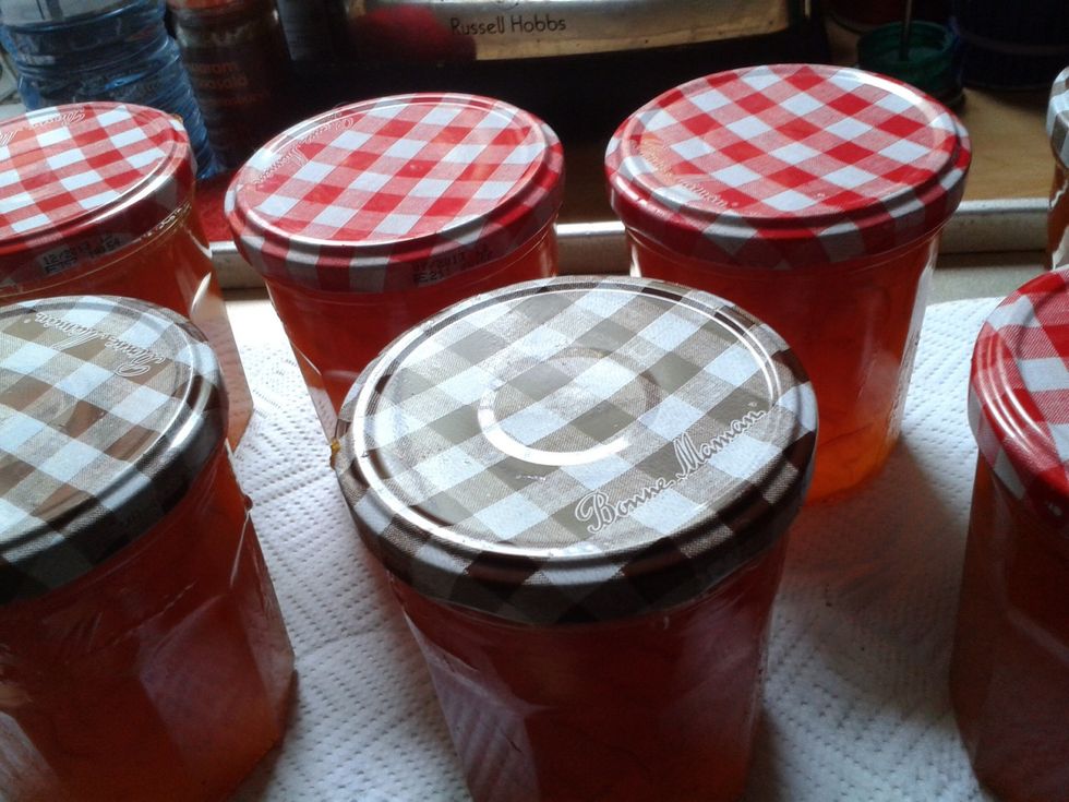 If you got the lids on quickly enough the button in the centre of the lid will pop down as the jars cool indicating a good seal.