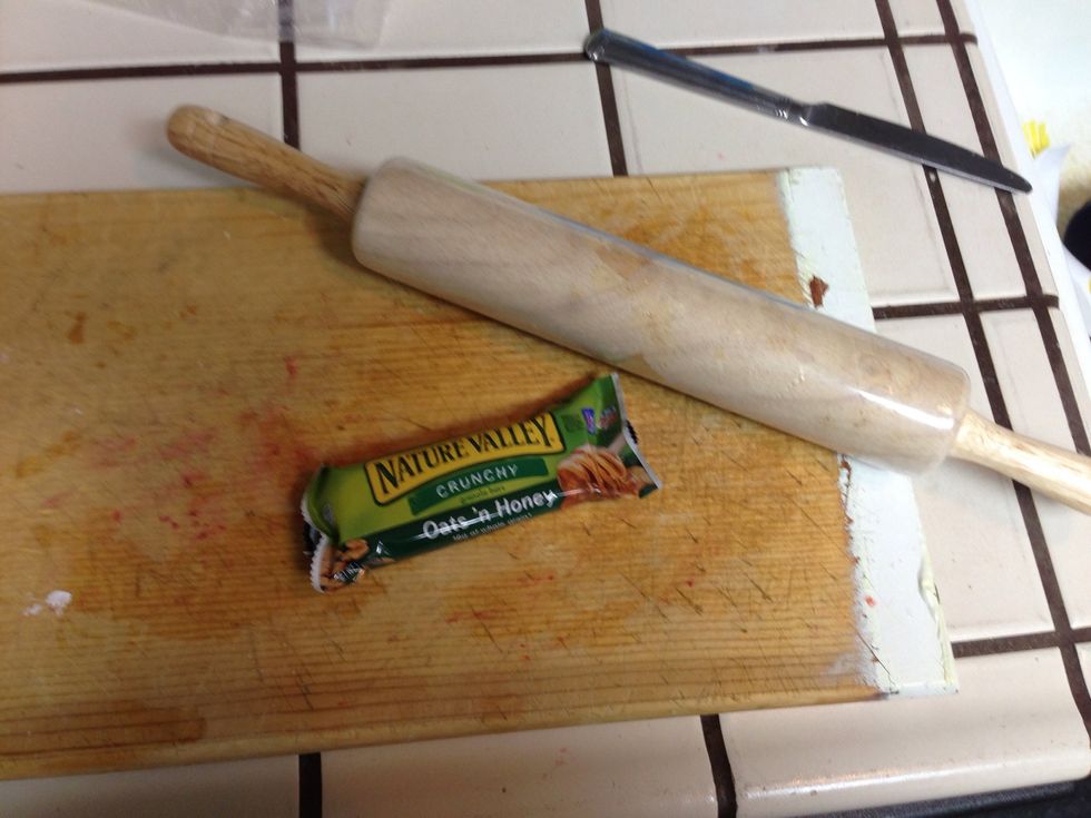 If you have a dough roller use it to break the granola into pieces in the wrapper.... less clean up