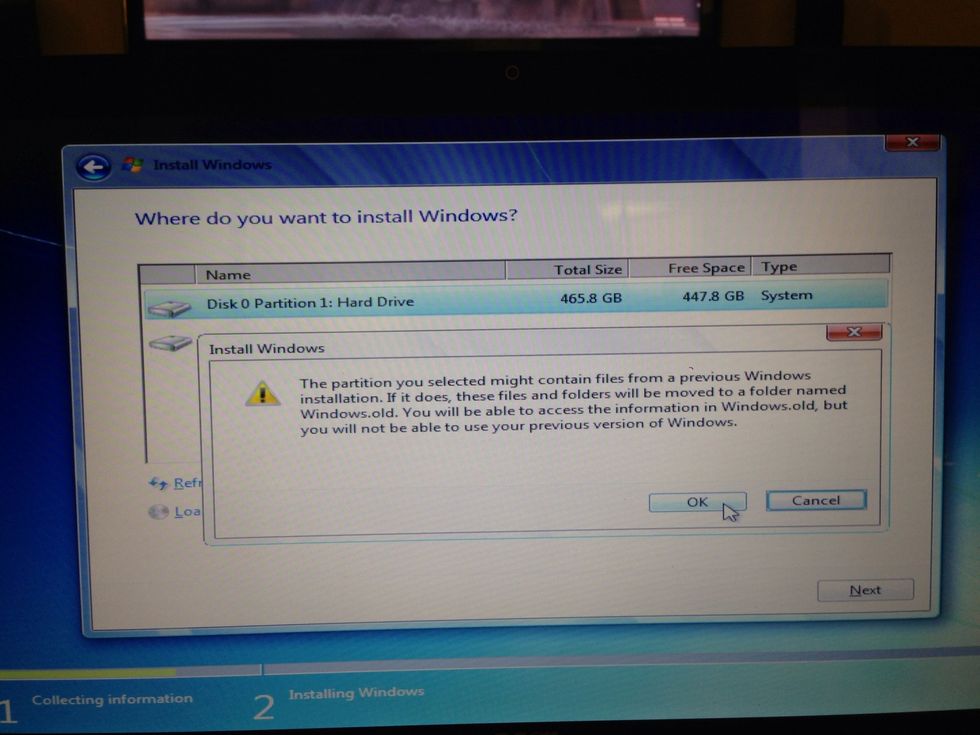 If you have a hard drive with a previous copy of windows, it backs up your files for you. Good on you, windows. Move the mouse to the ok button and click.