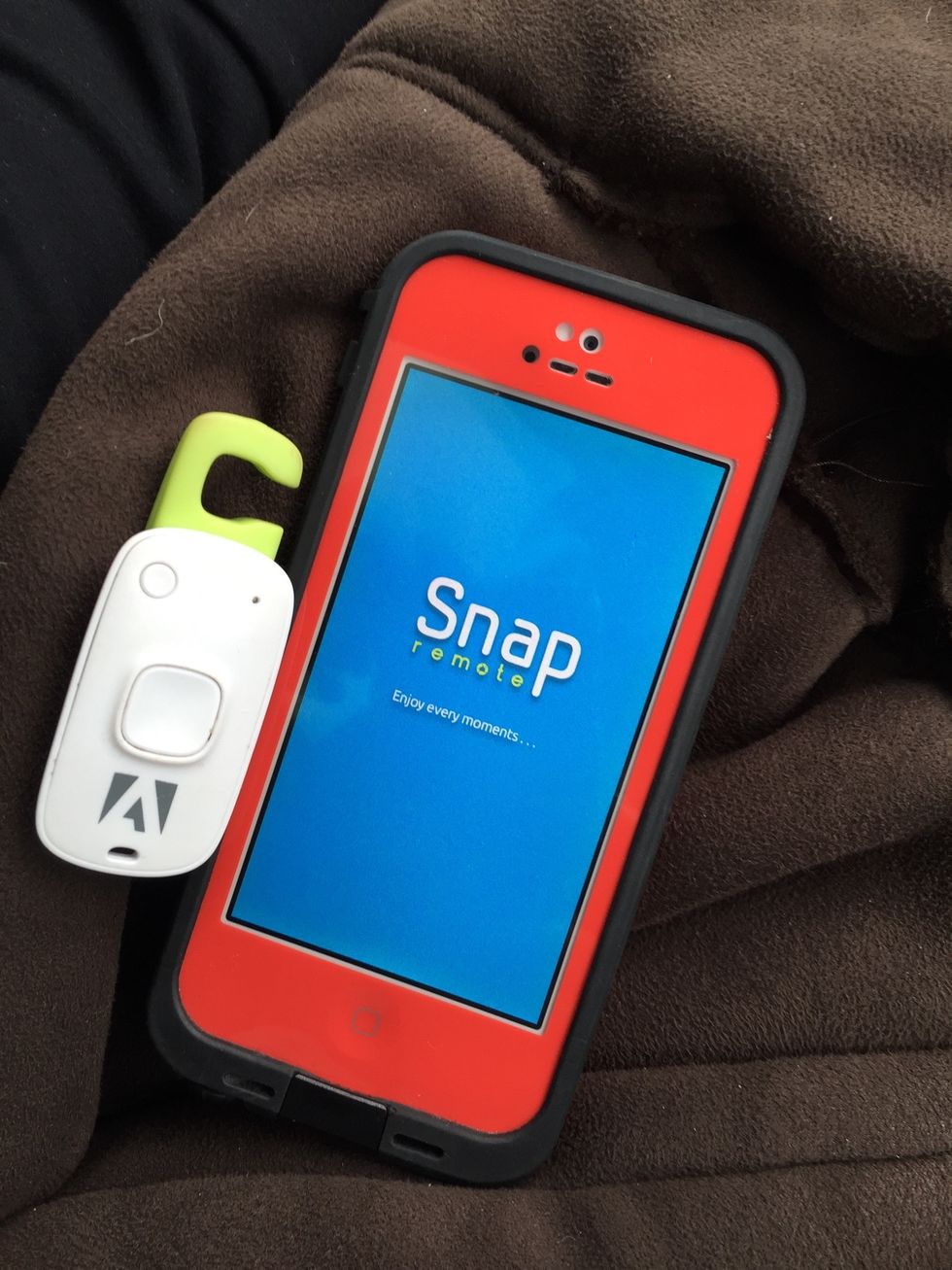 If you have a remote shutter, shooting your photos at the exact same time will be much easier. Download the app that pairs with the shutter. (Snap Remote) for example (on both phones)