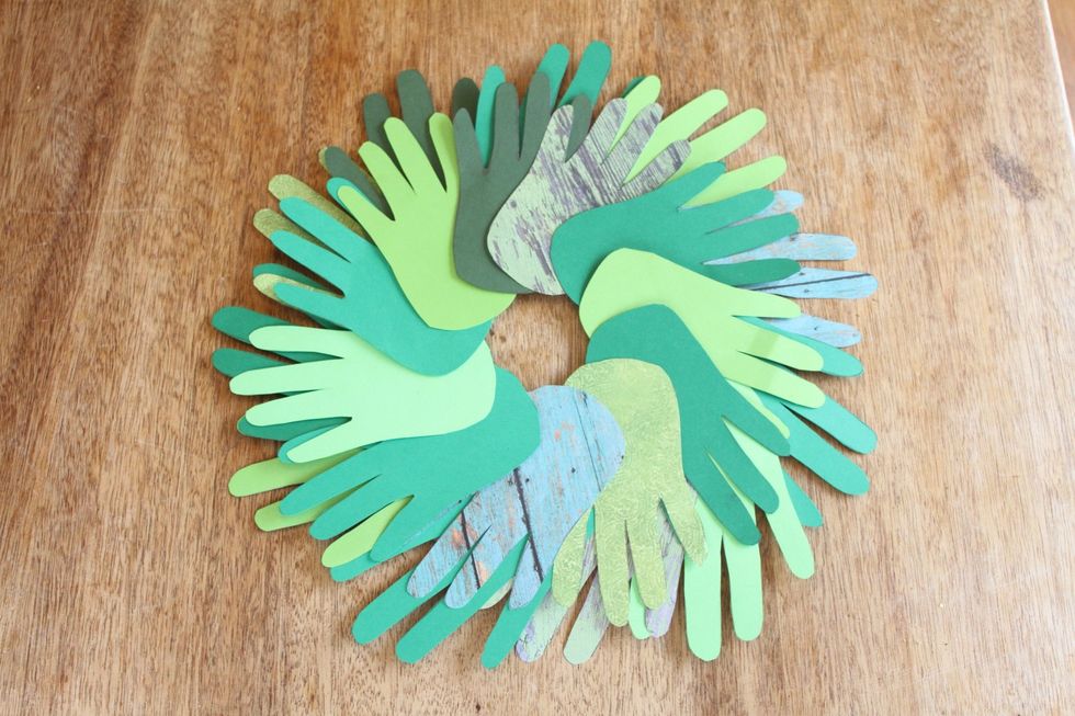 If you have a second or third set of handprints, repeat the process, making sure the largest set of hands is in the back and the smallest set in in the front.