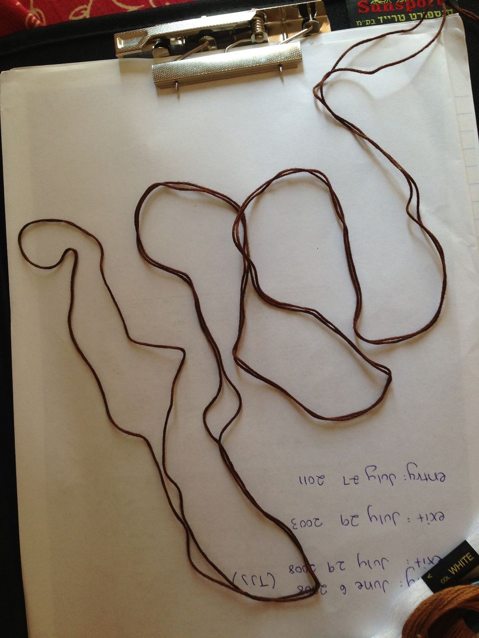 If you have an even number of strings of a certain color, I suggest cutting a string twice the size (8-10 ft) and folding it in half. This way we can make our buckle at the beginning.