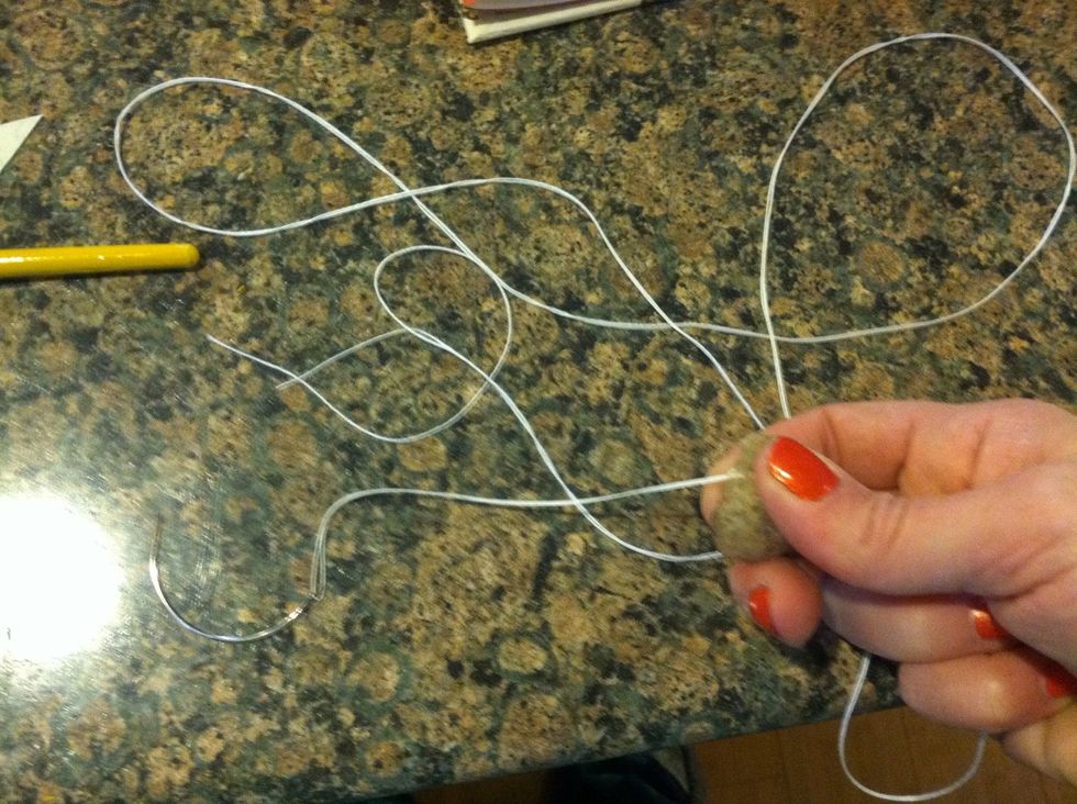 If you have bees wax or a candle... Wax your thread, it keeps the thread together and acts as a barrier if you use water color on one page but don't want it to travel to other pages