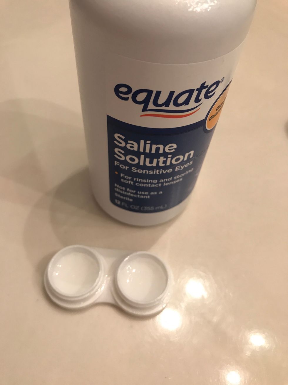If you have daily contacts you can just through them away, but if not place the left contact in your left contact holder and your right in the right, be sure to put contact solution in the container.
