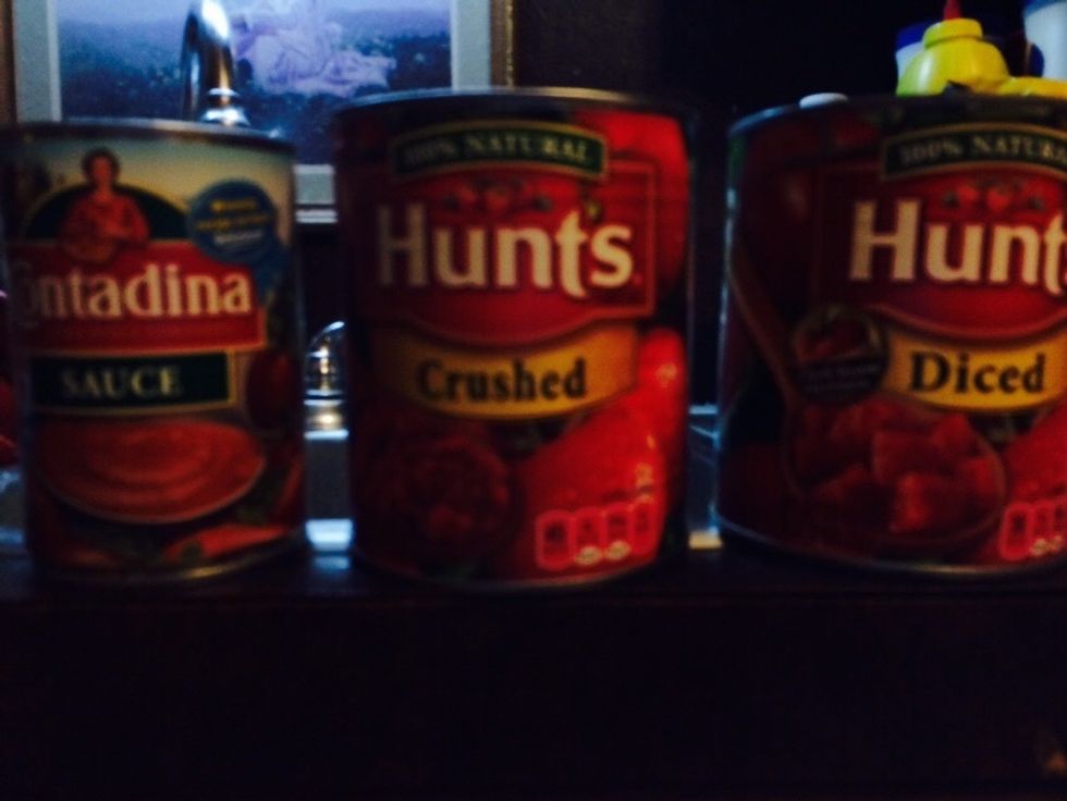 If you have on hand, you can choose fresh tomatoes, canned whole tomatoes, crushed, diced, paste, a sauce or the juice. It's really up to you. Add as little or a lot as you like.