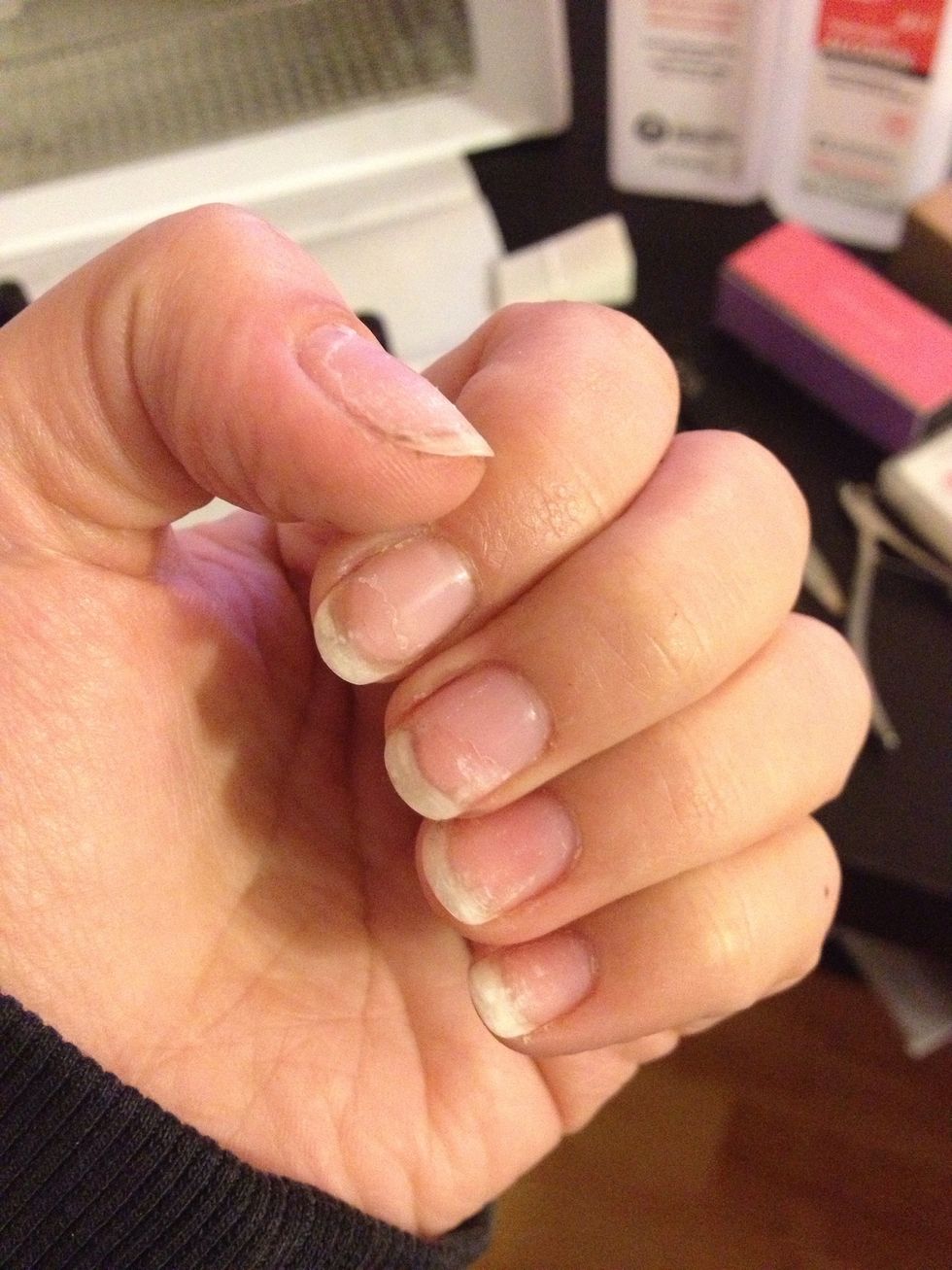 If you have previous shellac paint on grab your 100% acetone. That's what removes the gel polish.