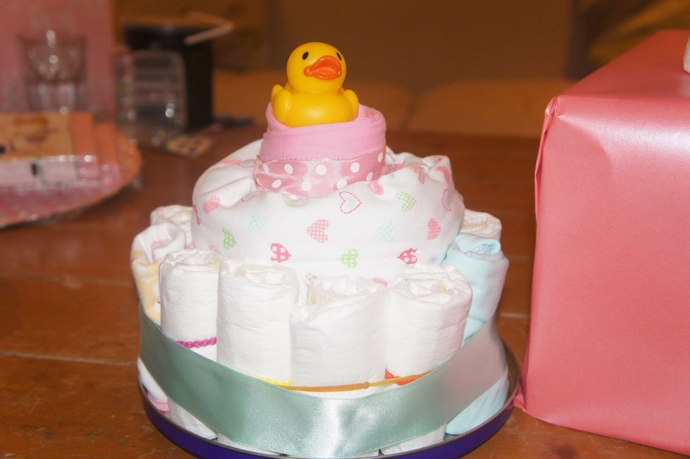 If you have some materials left over, why not make a mini one!! I used the metal tin lid as a base and placed a folded blanket in the centre so the elastic band could go around it.