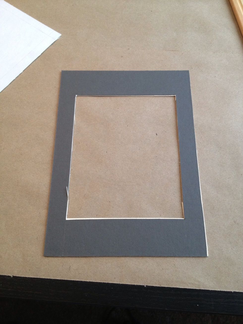 If you have strands of paper fibers, you can pull them off or use an exacto knife to run the blade across the edges