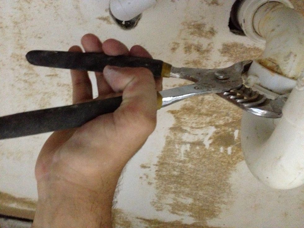 If you have to, carefully use channel locks to loosen it up. Remember it's plastic, so be easy.